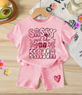 Sassy Just Like My Mama pink baby t-shirt and shorts set on hanger