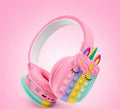Pink unicorn pop-it Bluetooth headphones with rainbow horn, ears and pastel bubble sensory panels