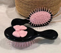 Oval Bow Hairbrush